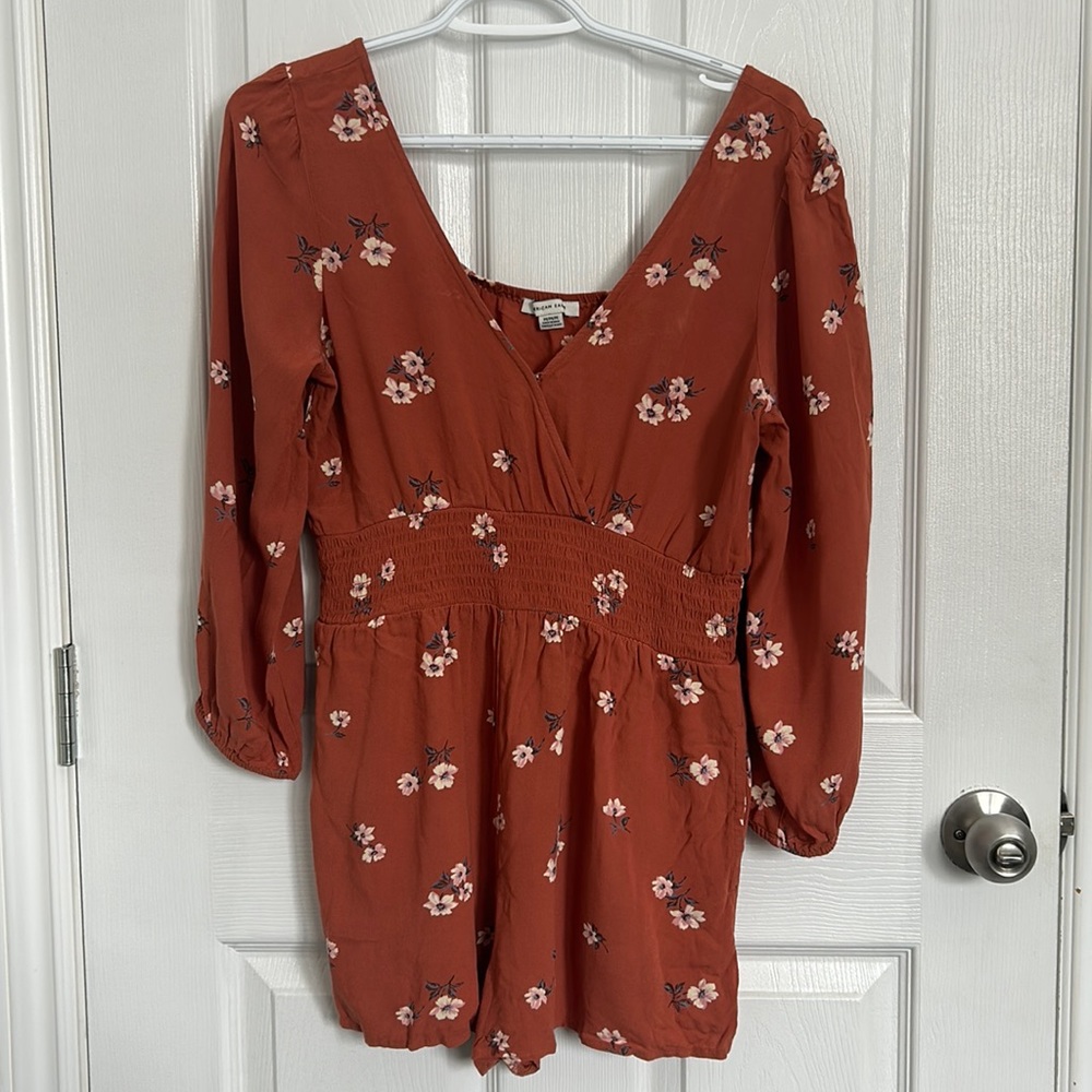 Floral peach coloured romper